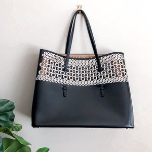ALAIA Metallic Grommet Leather Expandable Tote Bag
